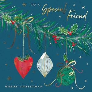 Delight your customers with this charming 'Friend Female' Christmas card from the Great British Card Company. Perfect for sending heartfelt festive wishes, the design features a beautifully illustrated pine branch adorned with classic holly and berries. Three unique baubles – a striking red heart, an elegant geometric design, and a traditional green bauble – hang gracefully, accented with shimmering gold details. The rich teal background and 'To A Special Friend' message in elegant script make this card truly stand out. Each pack contains 6 cards, ready for your seasonal display.