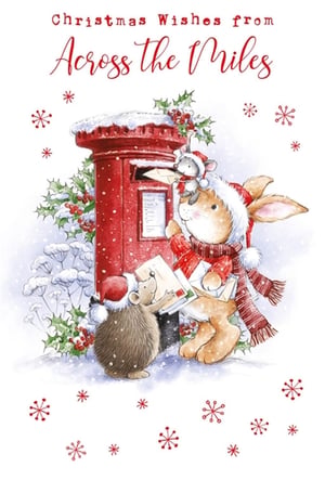 Send the warmest festive greetings to loved ones near and far with our delightful 'Across The Miles' Christmas card. This enchanting design features an adorable trio of woodland friends – a charming rabbit, a sweet hedgehog, and a tiny mouse – gathered around a snow-dusted, classic red post box. Dressed in their cosy Christmas hats and scarves, they're busy sending out heartfelt wishes. Adorned with festive holly and delicate snowflakes, this heartwarming scene beautifully captures the spirit of connecting with those you cherish, no matter the distance. It's the perfect way to bridge the miles and share your Christmas joy this holiday season.