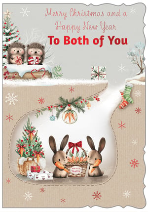 Spread double the joy this festive season with our delightful 'To Both Of You' Christmas card! From Out of The Blue Studios Ltd., this charming design features an enchanting winter wonderland scene. Adorable hedgehogs exchange gifts under a snowy Christmas tree, while below, two sweet bunnies eagerly hold their carrot treats amidst festive decorations and presents.
The warm, inviting artwork and heartfelt message, 'Merry Christmas and a Happy New Year To Both of You,' make this card perfect for couples, friends, or family. Its unique layered design adds an extra touch of magic, ensuring it stands out on any mantelpiece. Stock up on this wonderfully whimsical card, available in a convenient pack of 6, and help your customers share their warmest wishes.