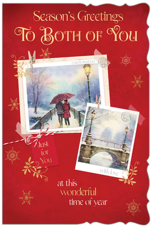 Share heartfelt Season's Greetings with our beautiful "To Both Of You" Christmas cards, designed by Out of The Blue Studios Ltd. This enchanting card features a romantic winter wonderland scene, depicting a couple walking hand-in-hand under a red umbrella on a snowy bridge, evoking the true spirit of the season. The charming 'polaroid' style images, complete with 'CARTE POSTALE' and 'with love' details, add a delightful vintage touch. With the warm message "Season's Greetings To Both Of You at this wonderful time of year," and a sweet 'Just for You' tag, these cards are perfect for sending your love to special couples. Each pack contains 6 cards, ready to spread festive cheer.