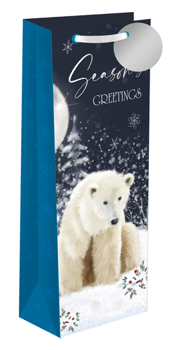 Make your bottle gifts truly special this festive season with our enchanting Moonlight Walk Bottle Bag. This stunning design from Out of The Blue Studios Ltd. captures the serene beauty of a winter night, featuring a majestic polar bear amidst a snowy forest under a luminous moon. Delicate snowflakes and elegant "Season's Greetings" text complete this captivating scene. Each bag includes a silver gift tag for that extra touch of sophistication. Perfect for wine, spirits, or other bottled gifts, these bags are sure to impress. Available in a convenient pack of 6, they're an essential addition to your seasonal gifting range.