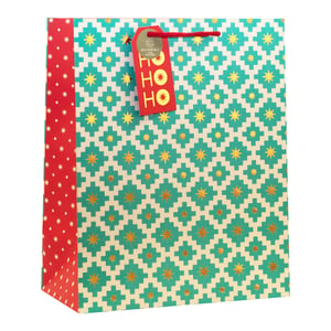Make your gifts shine with our Large Geo Star Gift Bag! This eye-catching bag features a stylish geometric pattern in teal and cream, adorned with shimmering gold stars. A vibrant red side panel with delicate white stars and matching red handles adds a festive touch. Each bag comes with a charming "HO HO HO" gift tag, proudly highlighting its eco-friendly and 100% recyclable credentials. Perfect for Christmas or any special occasion, these large bags are ideal for presenting generous gifts. Available in a convenient wholesale pack of 6 from Partisan Products Ltd.