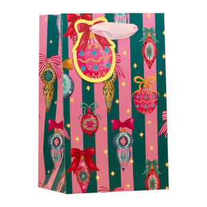 Add a touch of festive cheer to your customers' gifts with our delightful Small Bow Baubles Gift Bag! This eye-catching bag features a vibrant design of alternating pink and dark green stripes, adorned with an array of beautifully illustrated Christmas baubles, each topped with a charming bow. Golden stars twinkle across the background, adding an extra sparkle.
Complete with a matching bauble-shaped gift tag and elegant pink ribbon handles, this bag offers a truly special presentation for any present. Perfect for the holiday season, these bags are sure to make every gift feel extra thoughtful. Available in a convenient pack of 6 from Partisan Products Ltd.