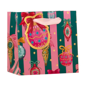 Add a touch of festive cheer to your gifts with our delightful Extra Small Bow Baubles Gift Bag! This charming bag features a vibrant design of pink and green stripes, adorned with an array of colourful Christmas baubles and sparkling gold stars. The elegant pink ribbon handle and a beautiful bauble-shaped tag with a red bow complete the look, making every present feel extra special.
Perfect for smaller treats and trinkets, these eye-catching gift bags are ideal for boutiques and gift shops looking to offer a premium packaging solution. Supplied by Partisan Products Ltd, each order contains a convenient pack of 6 bags, ensuring you're well-stocked for the holiday season.
