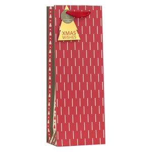 Make your festive gifting effortless and eco-conscious with our Christmas Essentials Bottle Bag. This charming bag features a vibrant red design with a modern dash pattern, beautifully contrasted by an olive green side panel adorned with delicate Christmas trees and stars. Each bag comes with a sturdy red ribbon handle and a delightful 'XMAS WISHES' tree-shaped gift tag. What's more, it proudly displays its 'ECO-FRIENDLY 100% Recyclable' credentials, making it a thoughtful choice for your customers. Perfect for presenting wine, spirits, or other bottled gifts, these essential bags are supplied in a convenient pack of 6, ensuring you're well-prepared for the holiday season.