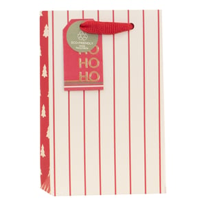 Make sure your gifts are wrapped with festive flair this season with our Small Christmas Essentials Gift Bag. This delightful bag boasts a classic red and white striped design, complemented by charming Christmas tree patterns on the side panels. A special touch is added by the attached tag, featuring "HO HO HO" in elegant gold lettering and proudly stating its eco-friendly, 100% recyclable nature. Finished with sturdy red ribbon handles, it's ideal for presenting smaller presents. Stock up with our convenient pack of 6, brought to you by Partisan Products Ltd., ensuring you're ready for all your holiday gifting needs.