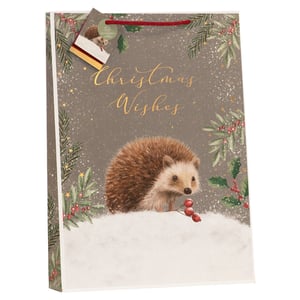 Make gift-giving extra special this Christmas with our charming Extra Large Christmas Hedgehog Gift Bag. This delightful bag from Partisan Products Ltd features an adorable hedgehog nestled in a snowy scene, surrounded by festive holly and pine branches. Golden 'Christmas Wishes' script adds a touch of elegance, while falling snow and subtle stars complete the magical wintery feel.
Perfect for those larger presents, this extra-large bag is not only beautiful but also eco-friendly, as indicated on the accompanying gift tag. Its sturdy construction and vibrant design make it a standout choice for customers looking for a memorable way to present their gifts. Available in a convenient pack of 6, these bags are sure to be a popular addition to your seasonal offerings.