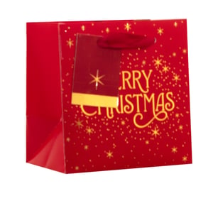 Make gifting effortless and festive this holiday season with our Extra Small Merry Christmas Gift Bag. This delightful red bag boasts elegant gold "Merry Christmas" script, beautifully complemented by a scattering of shimmering stars and dots. Each bag features strong red ribbon handles and a coordinating gift tag, ensuring your small presents are wrapped with care and style. Supplied by Partisan Products Ltd, these bags come in a handy pack of 6, making them a perfect choice for retailers preparing for Christmas.