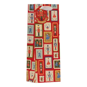 Make your Christmas gifting truly magical with our enchanting Nutcracker Bottle Bag! This festive bag features a delightful collage of Nutcracker-themed 'stamps', showcasing classic nutcracker soldiers, elegant ballerinas, and charming festive motifs. Set against a rich red background with shimmering gold details and soft pastel colours, it's the perfect way to present a special bottle of wine, spirits, or any tall gift this holiday season. The intricate design captures the wonder and joy of the Nutcracker ballet, making your present even more memorable. Complete with a sturdy white ribbon handle, this bag adds a touch of classic Christmas elegance to any gift.