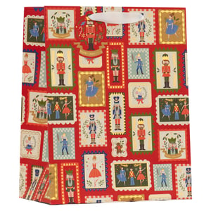 Make every gift extra special this festive season with our enchanting Large Nutcracker Gift Bag! Adorned with a delightful array of classic Nutcracker characters and scenes, each depicted in charming, stamp-like illustrations, this bag is a true Christmas treasure. The vibrant red background is beautifully complemented by subtle gold accents, adding a touch of luxury and sparkle. Perfect for presenting larger Christmas presents, its iconic design captures the magic and wonder of the holiday ballet. Stock up on these must-have bags for your customers. Available in a convenient pack size of 1x6 from Partisan Products Ltd.