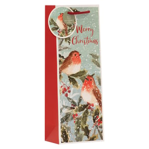 Introduce festive charm to your customers' gifting with our delightful Snowy Robins Bottle Bag. Perfect for presenting a special bottle of wine or spirits, this bag features a heartwarming design of cheerful robins perched amongst snow-dusted holly and berries. The 'Merry Christmas' message adds a traditional touch, while the vibrant red side panel and matching cord handle complete the look.
What's more, this beautiful bag is eco-friendly and 100% recyclable, appealing to environmentally conscious shoppers. Supplied by Partisan Products Ltd., these bags come in a convenient pack size of 1x6, ready to stock your shelves for the holiday season.