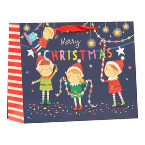 Get ready for a festive Christmas with our Large Shopper Elves Gift Bag! This delightful bag features a charming scene of cheerful elves busily preparing for the holidays. One elf holds a giant candy cane, another is tangled in colourful fairy lights, and a third is cutting out decorations, all under a bright 'Merry Christmas' banner. The dark blue background is sprinkled with stars and confetti, creating a wonderfully festive feel.
With its generous size and sturdy red ribbon handles, this gift bag is perfect for presenting those special Christmas presents. Stock up your shelves with this appealing design, sure to be a customer favourite! Available in a convenient pack size of 1x6 from Partisan Products Ltd.
