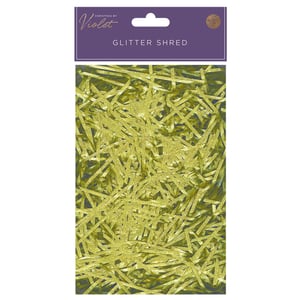 A package of glitter shred that is Christmas-themed by Violet.