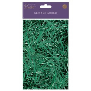 A package of green glitter shred by violet.
