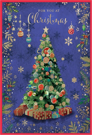 Celebrate the festive season with this enchanting Christmas card from Simon Elvin. Featuring a magnificent, richly decorated Christmas tree, this card is a true visual delight. Adorned with a sparkling star and an array of colourful baubles in reds, blues, and golds, the tree stands proudly amidst a scattering of beautifully wrapped presents.

The deep royal blue background, subtly patterned with delicate snowflakes, provides a perfect backdrop for the shimmering gold foliage and hanging ornaments that frame the scene. The elegant gold script reads "FOR YOU AT Christmas," making it a wonderfully versatile choice.

This 'Open Male' design is ideal for sending warm wishes to any special man in your life. Each pack contains 6 cards, ensuring you're well-stocked for the holidays. Share the joy and magic of Christmas with this truly captivating card.