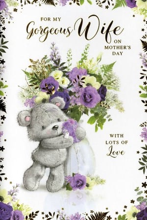 Celebrate your gorgeous wife this Mother's Day with this delightful card from Simon Elvin. This charming design features an adorable grey teddy bear, tenderly holding a gift, set against a vibrant bouquet of purple, white, and green flowers. The elegant floral border complements the loving message: 'FOR MY Gorgeous Wife ON MOTHER'S DAY WITH LOTS OF Love'. It's a thoughtful way to show appreciation. These cards come in a convenient pack of 6, making them an excellent choice for your Mother's Day range. (Pack size: 1x6)