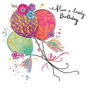 Send warm wishes with this delightful 'Open Birthday Female' card from Paper Rose. This vibrant design features a beautiful cluster of balloons, intricately patterned in rich purples, pinks, and teals, and adorned with charming floral details and colourful tassels. The elegant handwritten message, "Have a lovely Birthday," adds a personal touch. Scattered confetti and golden accents complete this cheerful celebration. Perfect for any female recipient, these cards are a lovely way to mark a special day. Each pack contains 6 high-quality cards, ready to bring joy to your customers.