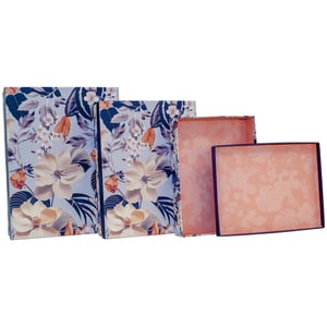 Elevate your packaging with our exquisite Zara 3 Nested Shirt Boxes. This single pack offers three beautifully coordinated boxes, perfect for enhancing your product presentation or gifting solutions. The exterior showcases a captivating design featuring delicate white and peach-toned blooms, rich blue foliage, and subtle orange accents, all set against a serene light blue background. Open them to reveal a charming peach-coloured interior, subtly patterned with a complementary floral motif. Ideal for shirts, accessories, or luxury gift sets, these nested boxes provide both practical storage and a delightful unboxing experience. Supplied by Partisan Products Ltd., they are a sophisticated choice for any retailer.