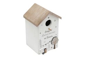 Bring a touch of rustic charm to any home or garden with this delightful 22cm Wooden Birdhouse. Featuring a natural wood roof and a sweet white finish, it's adorned with an adorable caravan and tree decor. The heartwarming message, "Always at Home wherever we Roam," makes it a truly special piece. Perfect for bird lovers or those who cherish the spirit of adventure, this birdhouse adds character and warmth wherever it's placed. It's a wonderful decorative item that also offers a cosy spot for feathered friends. Supplied by Sifcon International PLC, each birdhouse comes individually packed.