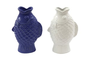 Bring a splash of nautical charm to any home with our delightful 21cm Fish Vases! Available in a convenient pack of two, these unique ceramic vases feature an eye-catching fish design, complete with beautifully textured scales and fins. You'll receive one vibrant blue and one crisp white vase, perfect for creating a coordinated display or adding a pop of colour to different rooms.
Standing at 21cm tall, they are ideal for showcasing small bouquets, single stems, or simply as charming decorative pieces. Their playful yet elegant design makes them a wonderful addition to coastal-themed interiors, bathrooms, or children's rooms. Stock up on these popular items from Sifcon International PLC and offer your customers something truly special.