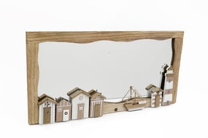 Bring the serene beauty of the seaside into any home with our delightful 60cm Wooden Framed Coastal Scene Mirror. This charming mirror features a rustic wooden frame, artfully crafted with a wavy top edge reminiscent of ocean waves.
Adorning the base is an enchanting 3D coastal tableau, complete with quaint beach huts, a classic sailboat, and a picturesque lighthouse. The natural wood tones and subtle colours evoke a calming, nautical feel, perfect for adding a touch of seaside charm to bathrooms, hallways, or living spaces. Each mirror is supplied individually, making it an ideal choice for unique home decor offerings.