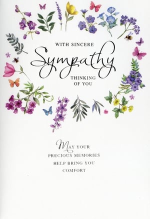 Offer a heartfelt message of comfort with our beautiful Sympathy card from Simon Elvin. This thoughtful design features a delicate watercolour wreath of colourful flowers, including gentle purples, pinks, and yellows, adorned with graceful butterflies and a busy bee, creating a serene and uplifting feel.

The front of the card expresses 'WITH SINCERE Sympathy THINKING OF YOU' in elegant script, while the inside offers a comforting message: 'May your precious memories help bring you comfort.' Perfect for customers seeking a sensitive and caring way to express their condolences. Each pack contains 6 cards, ensuring you're well-stocked with this essential item.
