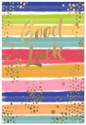 Brighten someone's day with our vibrant 'Good Luck' cards from Simon Elvin. This eye-catching design features a cheerful array of hand-painted horizontal stripes in a rainbow of colours, including blues, greens, pinks, and oranges. The uplifting 'Good Luck' message is beautifully rendered in shimmering gold foil script, adding a touch of sparkle and premium feel. Complementing the text are scattered gold confetti dots and stars, enhancing the celebratory mood.
Perfect for a multitude of occasions – from exams and new jobs to moving house or any new adventure – these cards are sure to bring a smile. Stock up your shelves with this popular design, available in a convenient pack of 6. A fantastic choice for any retailer looking to offer a cheerful and high-quality good luck card.