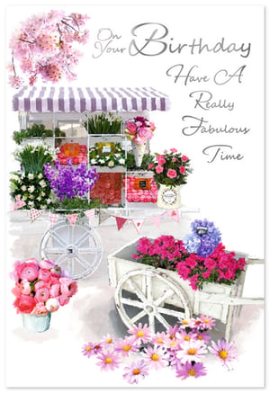 Celebrate her special day with this enchanting 'Open Birthday Female' card from Simon Elvin. This delightful card features a charming watercolour illustration of a bustling flower stall, overflowing with vibrant blooms in shades of pink, purple, and white. Elegant silver script wishes "On Your Birthday Have A Really Fabulous Time," perfectly complementing the picturesque scene.
Decorative flower carts, adorned with more beautiful blossoms and whimsical bunting, add to the card's appeal. With delicate cherry blossoms framing the top, this card offers a touch of floral elegance and heartfelt wishes, making it perfect for any female recipient. Available in a convenient pack of 6, it's an ideal addition to your greeting card selection.