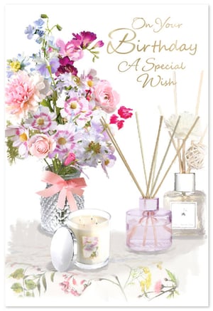 Offer your customers a truly delightful birthday greeting with our 'Open Birthday Female' card from Simon Elvin. This exquisite card features a stunning watercolour illustration of a vibrant floral bouquet, alongside elegant home fragrance items like a scented candle and reed diffusers. The beautiful gold script wishes 'On Your Birthday A Special Wish', adding a touch of sophistication. Perfect for celebrating any special woman, this card exudes charm and thoughtfulness. Stock up on this popular design, available in a convenient pack size of 1x6, and provide your customers with a premium choice for their loved ones' birthdays.