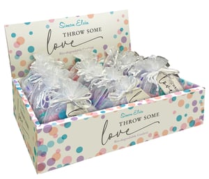 Add a sprinkle of joy and eco-consciousness to any celebration with Simon Elvin's Biodegradable Wedding Tissue Confetti. This wholesale pack includes 24 charming individual bags, each designed for guests to "Throw Some Love". Inside every delicate organza pouch, you'll find a vibrant mix of bio-degradable tissue confetti, ensuring a beautiful, guilt-free shower of colour. The eye-catching display box, adorned with playful polka dots and the elegant "love" script, makes for an irresistible retail offering. Perfect for weddings, anniversaries, or any special event, this confetti promises a truly memorable moment. Offer your customers this delightful way to celebrate responsibly and beautifully.