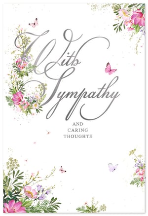 Offer a gentle message of support with our beautiful Sympathy card from Simon Elvin. This thoughtful design features delicate watercolour florals in soft pinks and purples, alongside lush green foliage and elegant butterflies. The comforting message, 'With Sympathy and Caring Thoughts', is gracefully presented in a shimmering silver script. These cards provide a respectful way to express condolences and are a perfect choice for your customers during difficult times. Available in a convenient wholesale pack of 6, ensuring you're always stocked.