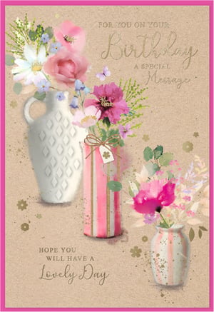 Brighten her birthday with this delightful 'Open Birthday Female' card from Simon Elvin. Featuring a charming watercolour design, this card showcases an array of beautiful pink and purple flowers artfully arranged in stylish vases against a warm, textured background. Delicate gold accents and a sweet butterfly add a touch of sparkle and elegance. The heartfelt messages, 'FOR YOU ON YOUR Birthday A SPECIAL Message' and 'HOPE YOU WILL HAVE A Lovely Day', make this card perfect for any special woman in your life. Its versatile design ensures it's suitable for a wide range of recipients. Stock up on this lovely design, available in convenient packs of 6.