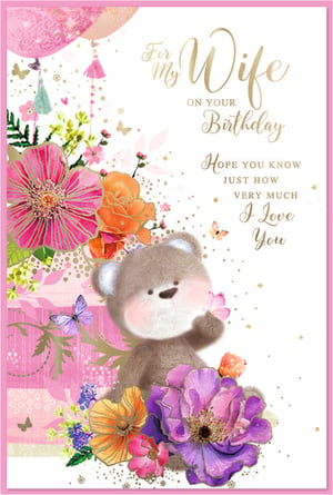 Show your wonderful wife just how much she means to you on her birthday with this delightful card from Simon Elvin. Adorned with a charming teddy bear, vibrant floral designs, and delicate butterflies, this card is a beautiful way to express your love. The elegant gold lettering highlights the heartfelt message: 'Hope you know just how very much I Love You.' Perfect for a truly special birthday, this card combines warmth and beauty. Available in a handy pack of 6, it's an ideal choice for retailers looking for quality birthday greetings for wives.