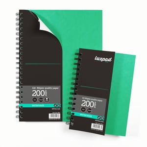 Elevate your stationery offering with our A5 Luxpad Spiral Notebooks, available in a convenient 1x6 pack from Sinclairs. These British-made notebooks are designed for everyday excellence, featuring a sleek black cover and a vibrant green accent that stands out. Each A5 notebook boasts 200 pages of high-quality 80gsm paper, perfect for smooth writing, drawing, or note-taking. The durable spiral binding ensures the notebook lays flat for comfortable use, making it an ideal choice for students, professionals, and creatives alike. Stock up on these essential, stylish notebooks today!