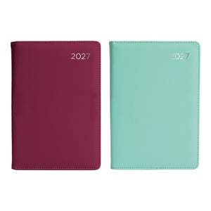 two notebooks with the year 2025 on them