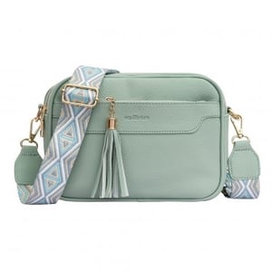 Introduce a touch of understated elegance to your collection with the Equilibrium Front Pocket Cross Body Bag in a lovely sage green. This practical and stylish cross-body design is perfect for everyday wear. It features a handy front slip pocket and a secure zipped main compartment, ideal for essentials. The distinctive wide strap showcases a modern geometric pattern in complementary blues and greys, adding a contemporary touch. Finished with subtle gold-tone hardware and a charming tassel detail, this bag offers both style and convenience. Available as single units from Y and L Company Ltd, it's a versatile addition for your customers.