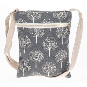Introduce a touch of timeless charm to your customers' accessories collection with our delightful Tree Of Life Cross Body Bag in Grey. This beautifully designed bag features an enchanting white 'Tree of Life' pattern set against a stylish grey background, offering a versatile and eye-catching look.
Perfect for everyday adventures, this compact cross-body bag is ideal for carrying essentials while keeping hands free. It boasts a secure top zip closure to keep belongings safe and a comfortable, adjustable strap for easy wear. Crafted with a lovely natural-feel fabric, it combines practicality with a charming, earthy aesthetic. A popular choice for those seeking a blend of style and convenience.