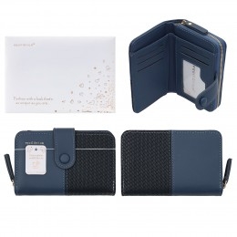 Discover our delightful Woven Plain Purse in a gorgeous blue, a perfect blend of style and practicality. This charming accessory features a distinctive woven texture beautifully contrasted with smooth panels, creating an effortlessly chic look.
Open it up to reveal ample space for your cards, notes, and a secure zipped compartment for coins, all neatly organised. With its convenient snap closure, your essentials will always be safe and sound. Compact yet incredibly functional, this purse is an ideal everyday companion, adding a touch of elegance to any outfit.