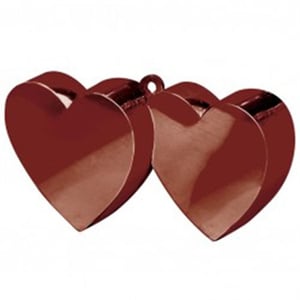 Two red hearts are sitting next to each other on a white background.