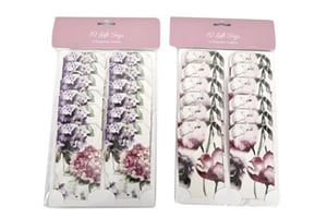 Two packages of gift tags with purple flowers on them.