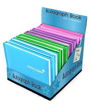 a display of autograph books in various colors.
