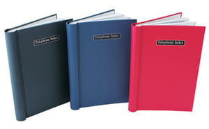 Three telephone index books are lined up in a row.