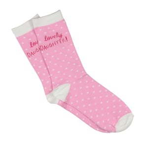 A pair of pink and white polka dot socks that say "lovely daughter".