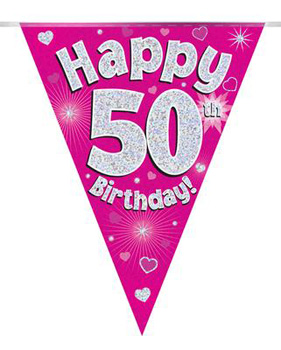 A pink banner that says "happy 50th birthday" on it.