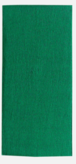 A green piece of paper is sitting on a white surface.