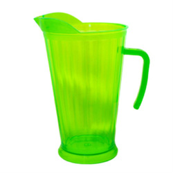 A green pitcher with a green handle is on a white background.