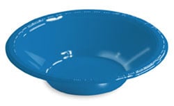 A blue plastic bowl is sitting on a white surface.
