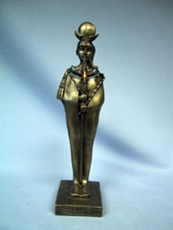 A bronze statue of a woman wearing a hat on her head.