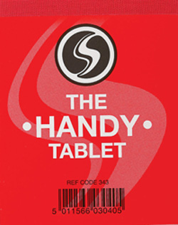 A red sign that says "the handy tablet."