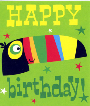 A green birthday card with a toucan and the words "happy birthday".